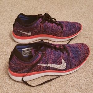 Nike free orange and blue shoes